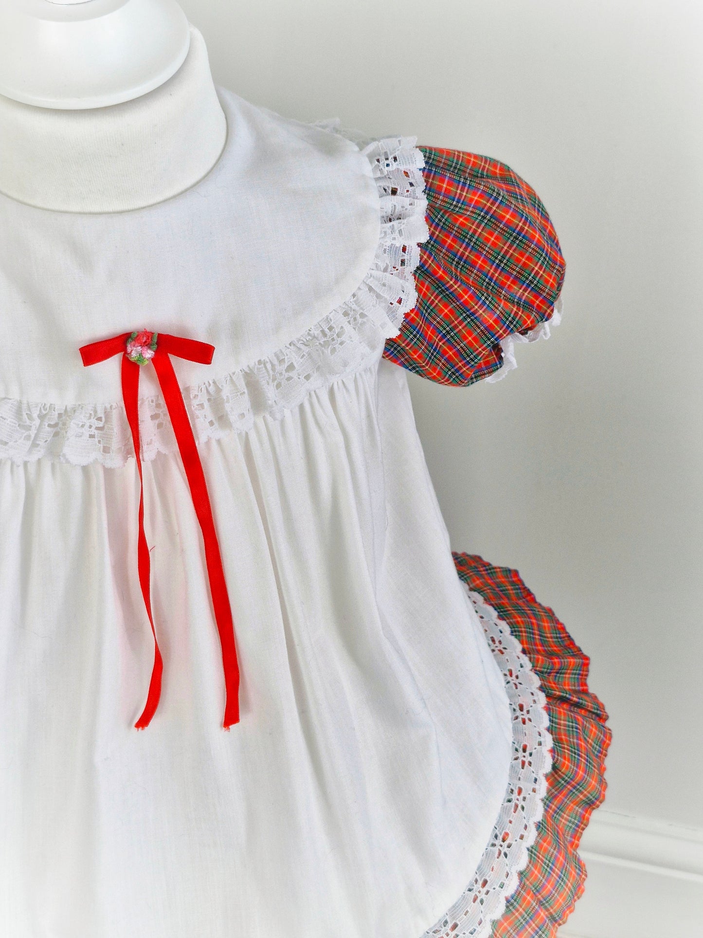 18-24 months. White and tartan vintage Sears with lace trim