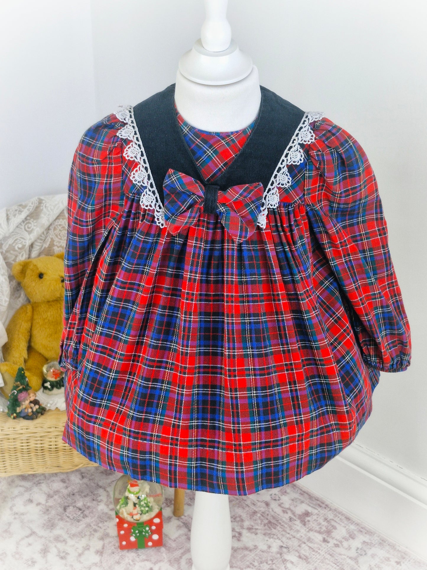 2 years. Red and navy tartan vintage dress from Ruth of Carolina.