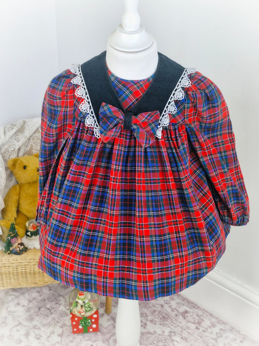 2 years. Red and navy tartan vintage dress from Ruth of Carolina.