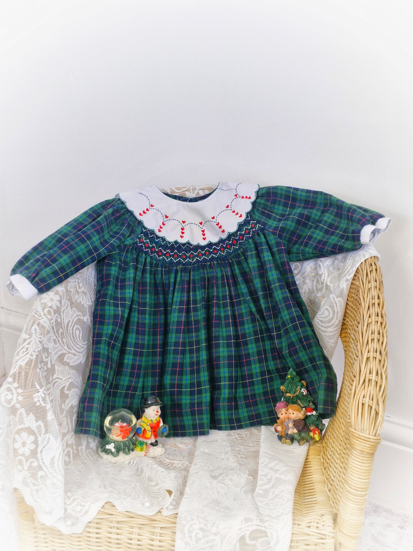 12-18 months. Carriage Boutique green tartan dress with smocking and embroidered bib