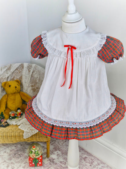 18-24 months. White and tartan vintage Sears with lace trim
