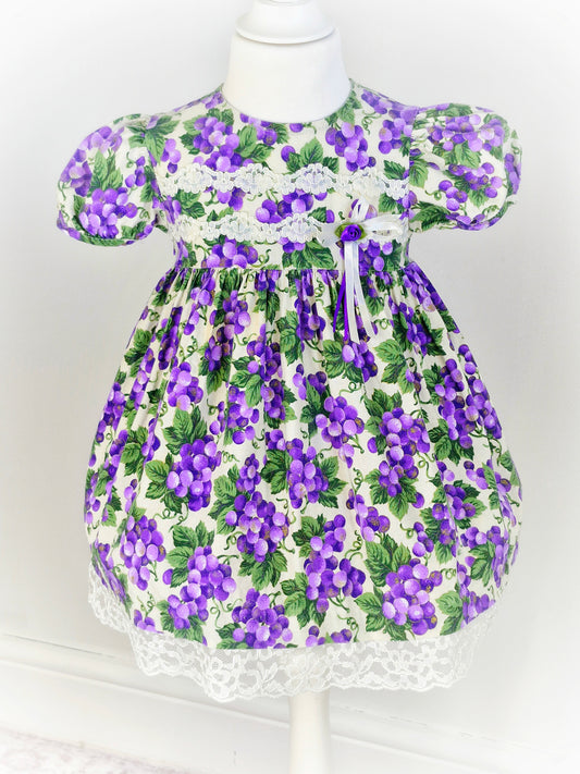 2 years. Vintage Jessica Ann, purple grapes with green leaves. Lace and ribbon details