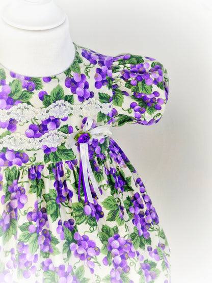 2 years. Vintage Jessica Ann, purple grapes with green leaves. Lace and ribbon details