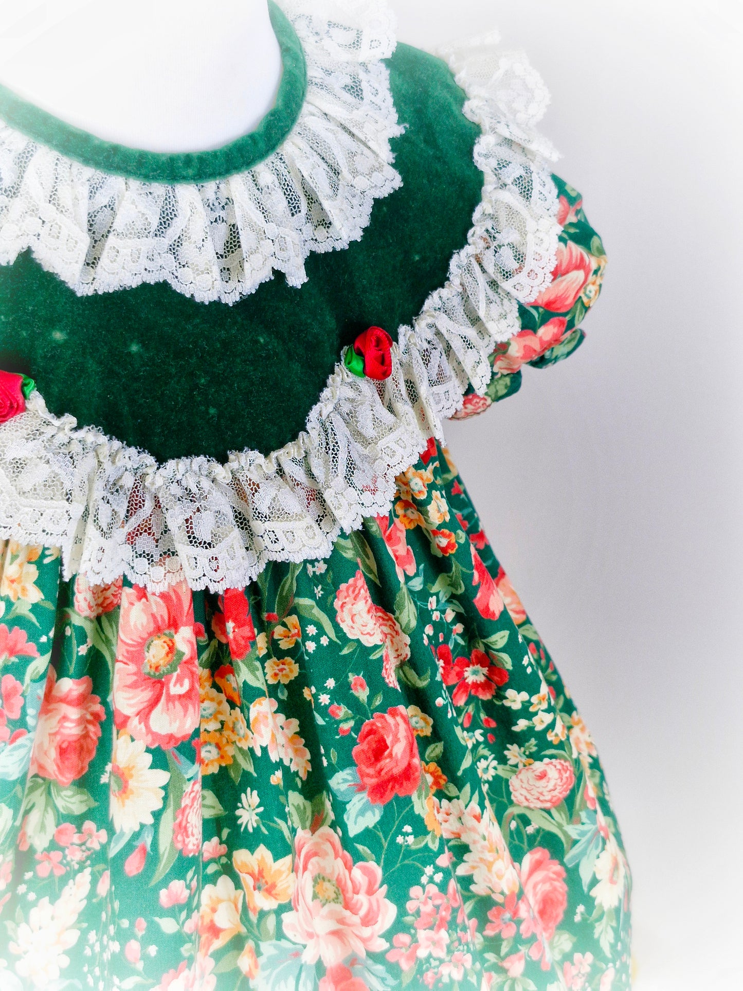 2-3 years. Green vintage floral Jolene with white lace. Minor faults*