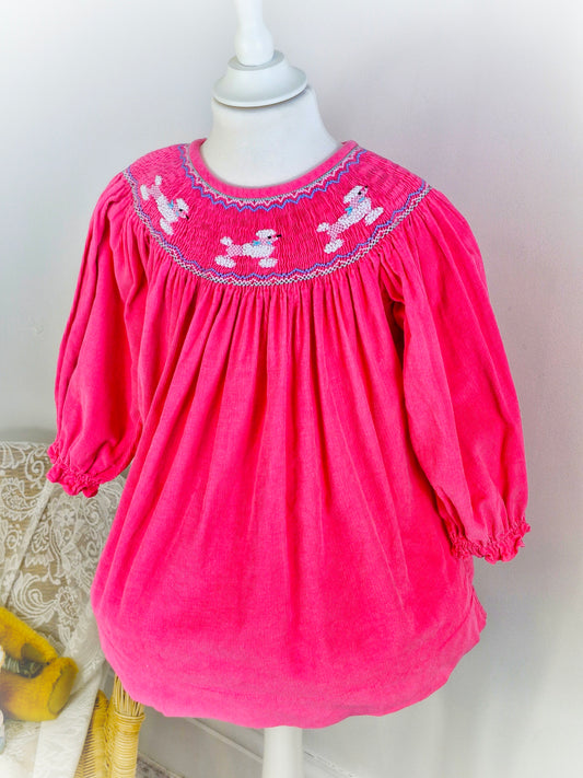 3 years. Hot pink corduroy vintage inspired dress with poodle embroidered on smocking