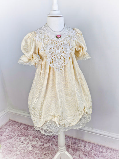 4 years. Ivory vintage dress with puffed sleeves, white lace bib and trim