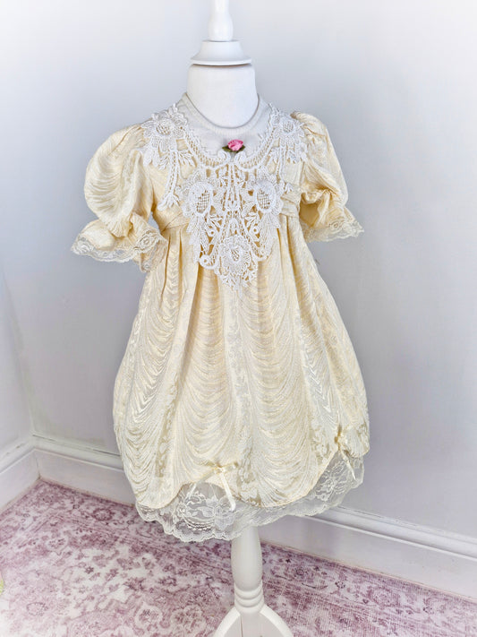 4 years. Ivory vintage dress with puffed sleeves, white lace bib and trim