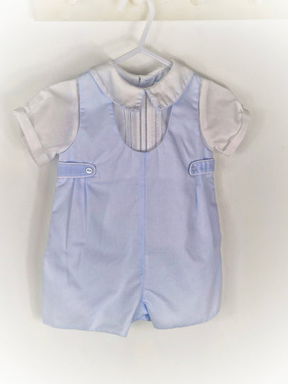 9 months. Blue and white collared romper from Petit Ami