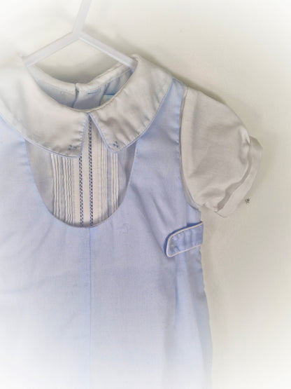 9 months. Blue and white collared romper from Petit Ami