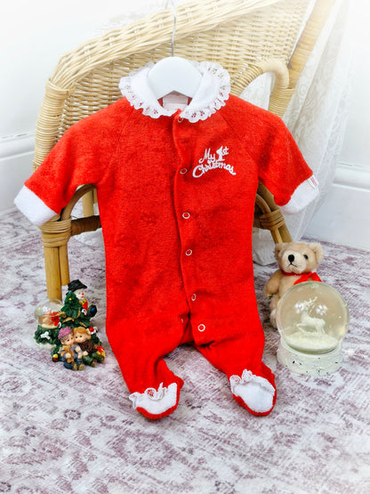 6-9 months. Red "My 1st Christmas" romper with white lace collar and feet