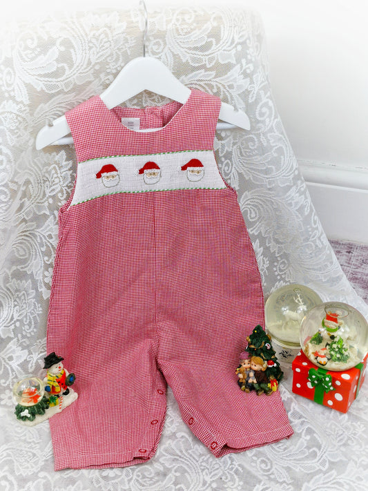 18 months. Red and white gingham romper with white smocking and embroidered Santa faces