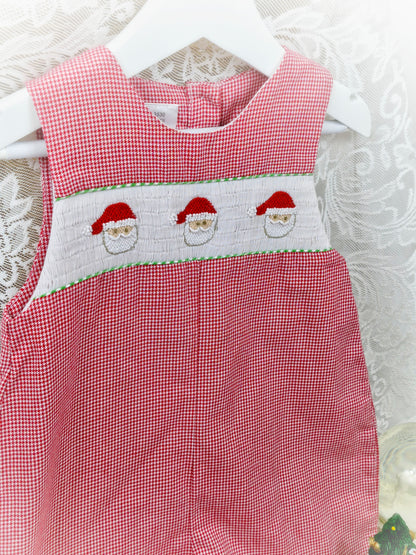 18 months. Red and white gingham romper with white smocking and embroidered Santa faces