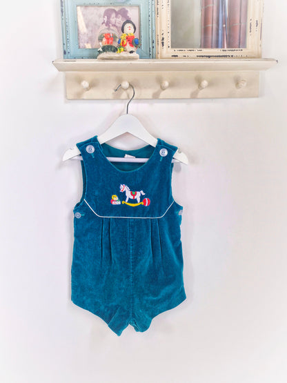 18-24 months. Forest green velvet romper with embroidered rocking horse