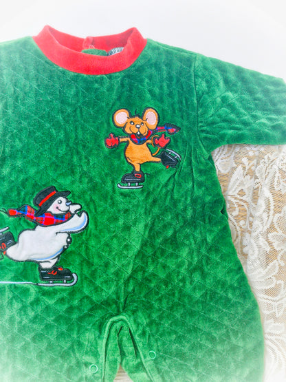 6-9 months. Green quilted romper with red trim, ice skating snowman and mouse
