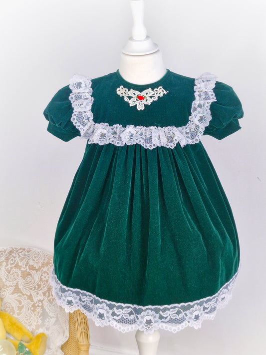 3 years. Dark green velvet dress, JoLene brand. Lace trim and hem