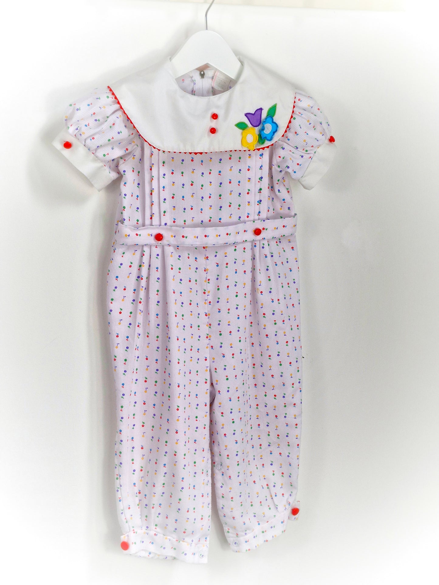 18-24 months. White vintage romper with floral stripes, white bib and flower applique