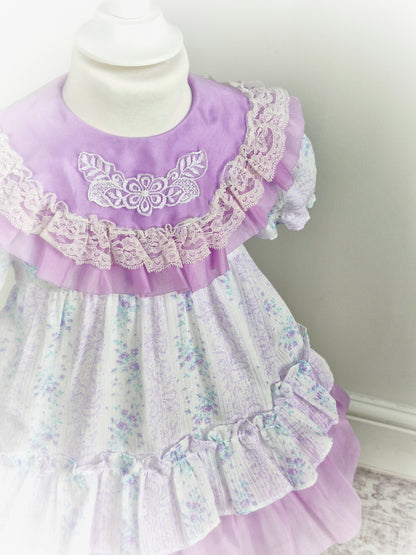 2-3 years. Lilac and white taffeta vintage dress with tiny blue flowers and lace details