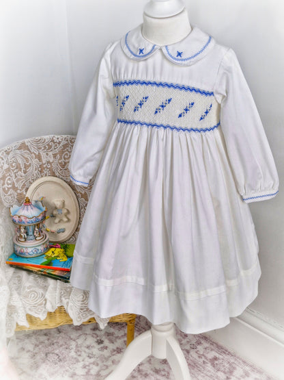 5 years. White Sarah Louise smock dress with blue embroidery