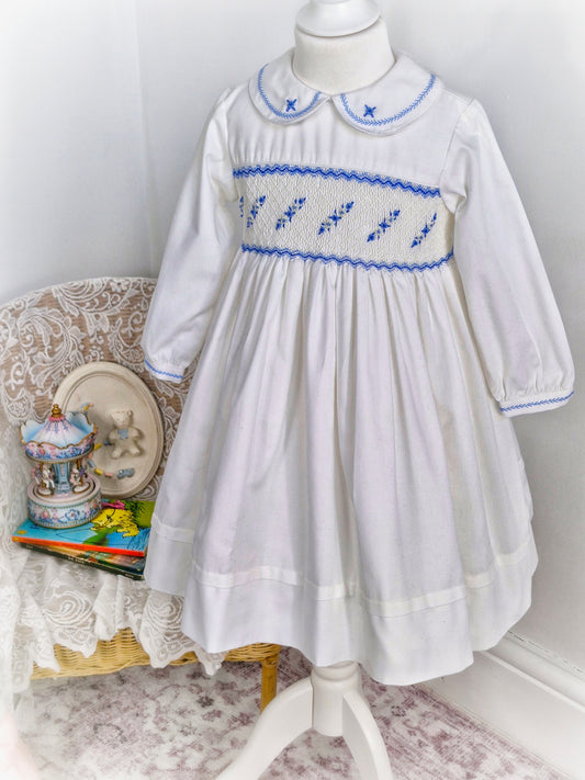 5 years. White Sarah Louise smock dress with blue embroidery