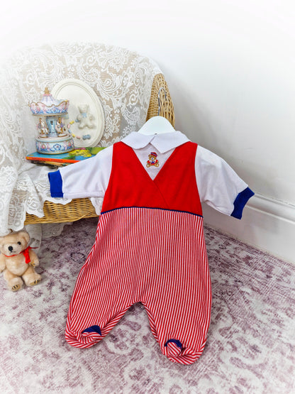 6-12 months. Red and white romper with navy details. Embroidered sailor bear