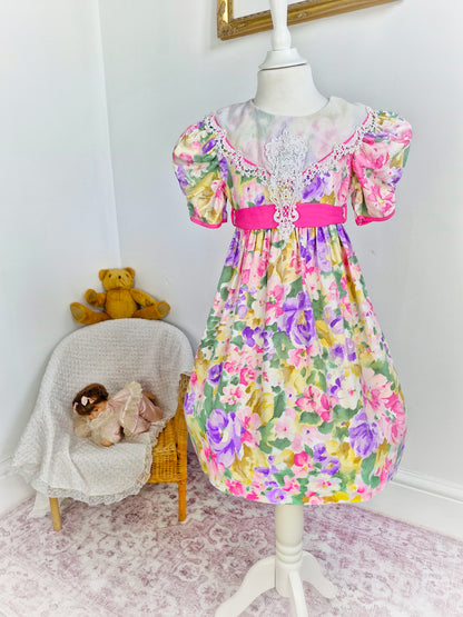 6-7 years. Vintage floral dress by Jolene with white bib