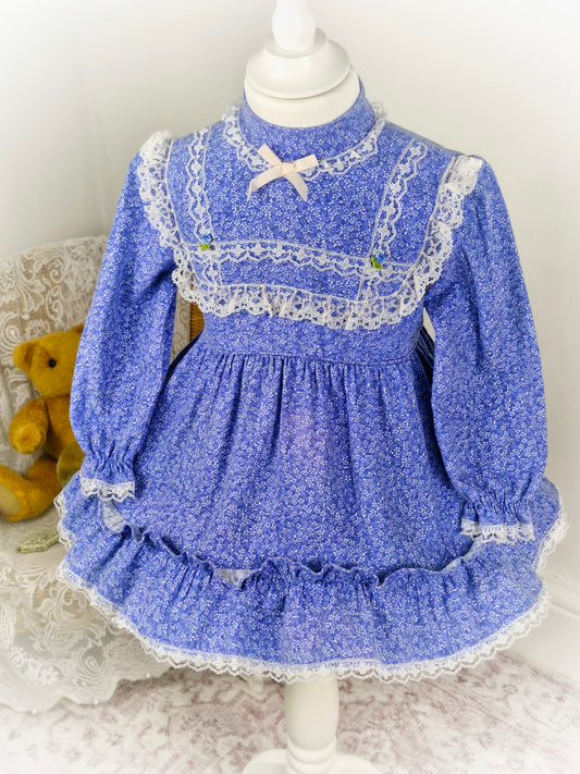 2 years. Blue vintage dress with white lace details. Small faults*