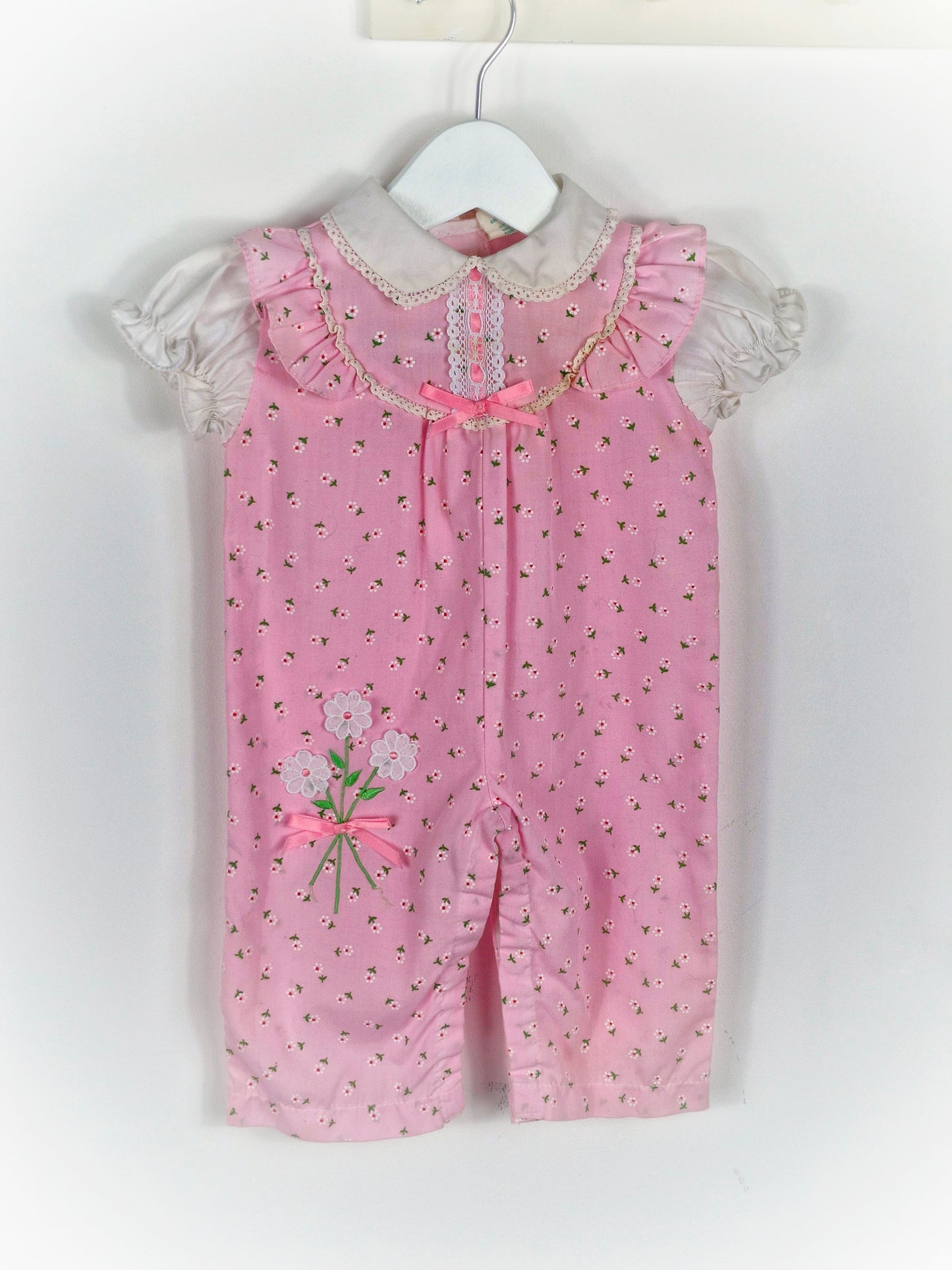 3-6 months. Tiny Tots vintage romper, pink with flower print, white collar and sleeves