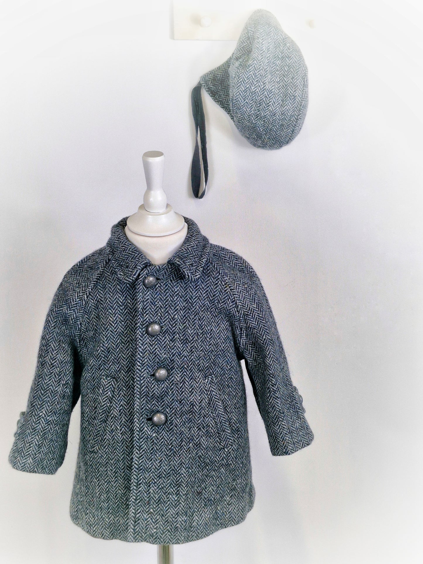 18-24 months. Grey vintage herringbone wool coat with collar and silver buttons and matching hat.