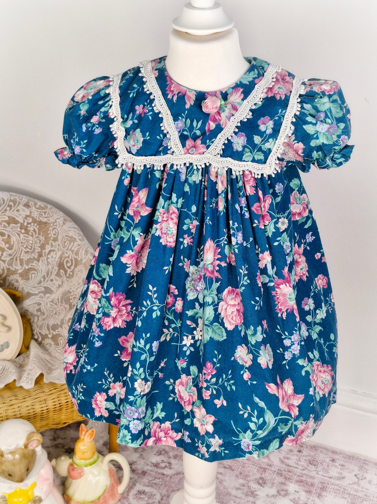 3 years. Teal vintage dress with pink flowers. Small fault*