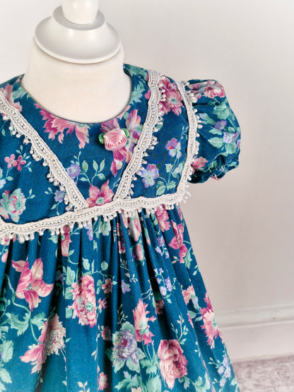 3 years. Teal vintage dress with pink flowers. Small fault*