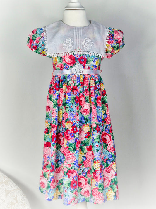 5-6 years. Vintage Rare Editions floral dress with white bib and ribbon