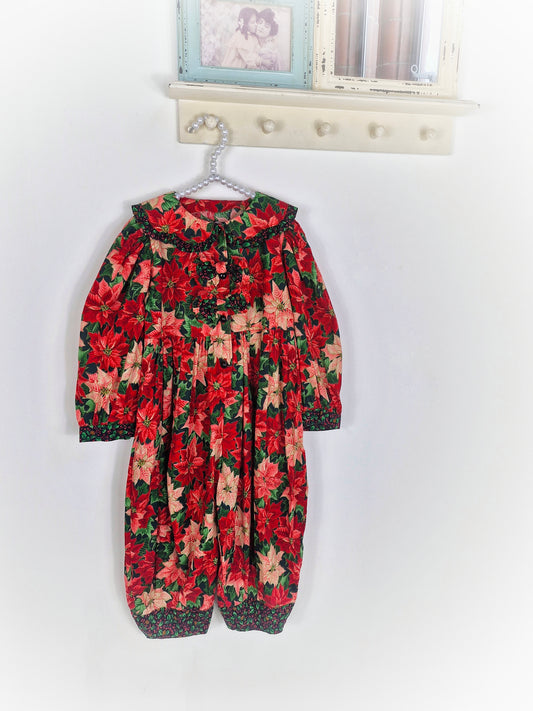 3 years. Vintage romper with poinsettia print, long sleeved with large collar and ruffle trim