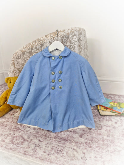 2 years. Light blue vintage double breasted jacket. Unisex.