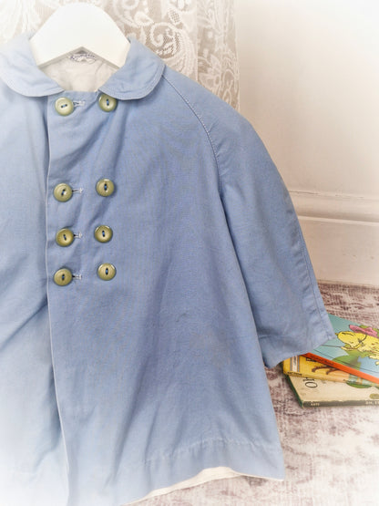 2 years. Light blue vintage double breasted jacket. Unisex.