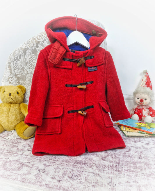 2-3 years. Red Vintage Gloverall duffle coat with hood and traditional toggle fastenings