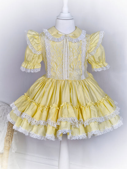 3-4 years. Lemon vintage dress with white lace, flutter puff sleeves, collar and layers.