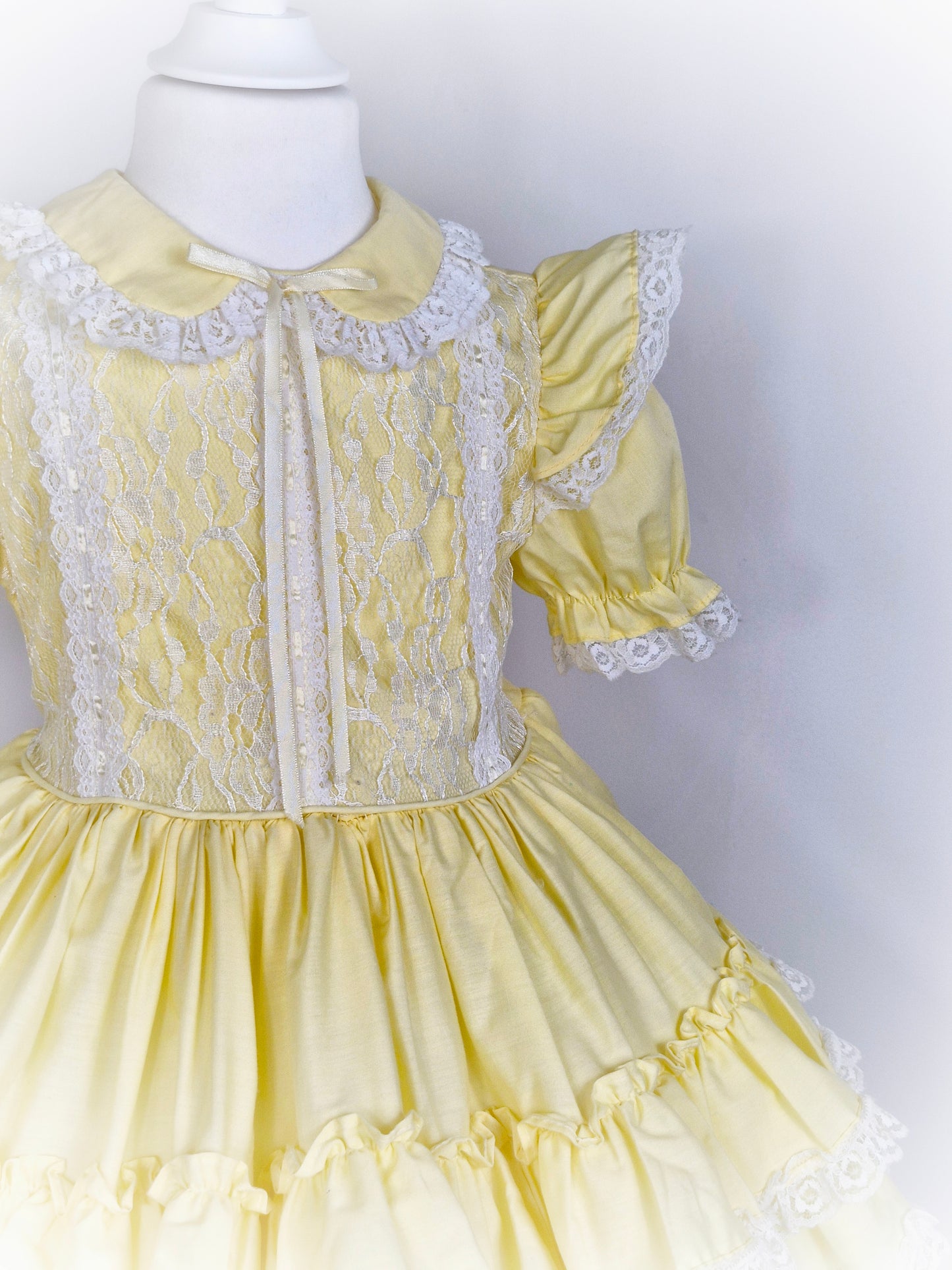 3-4 years. Lemon vintage dress with white lace, flutter puff sleeves, collar and layers.
