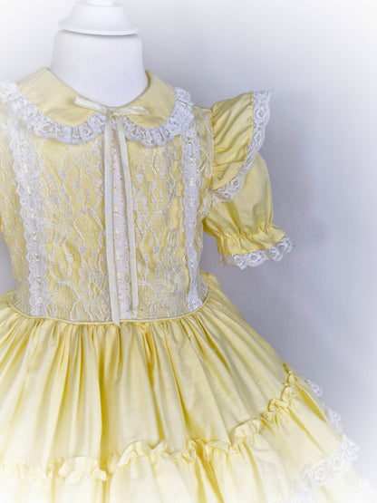 3-4 years. Lemon vintage dress with white lace, flutter puff sleeves, collar and layers.