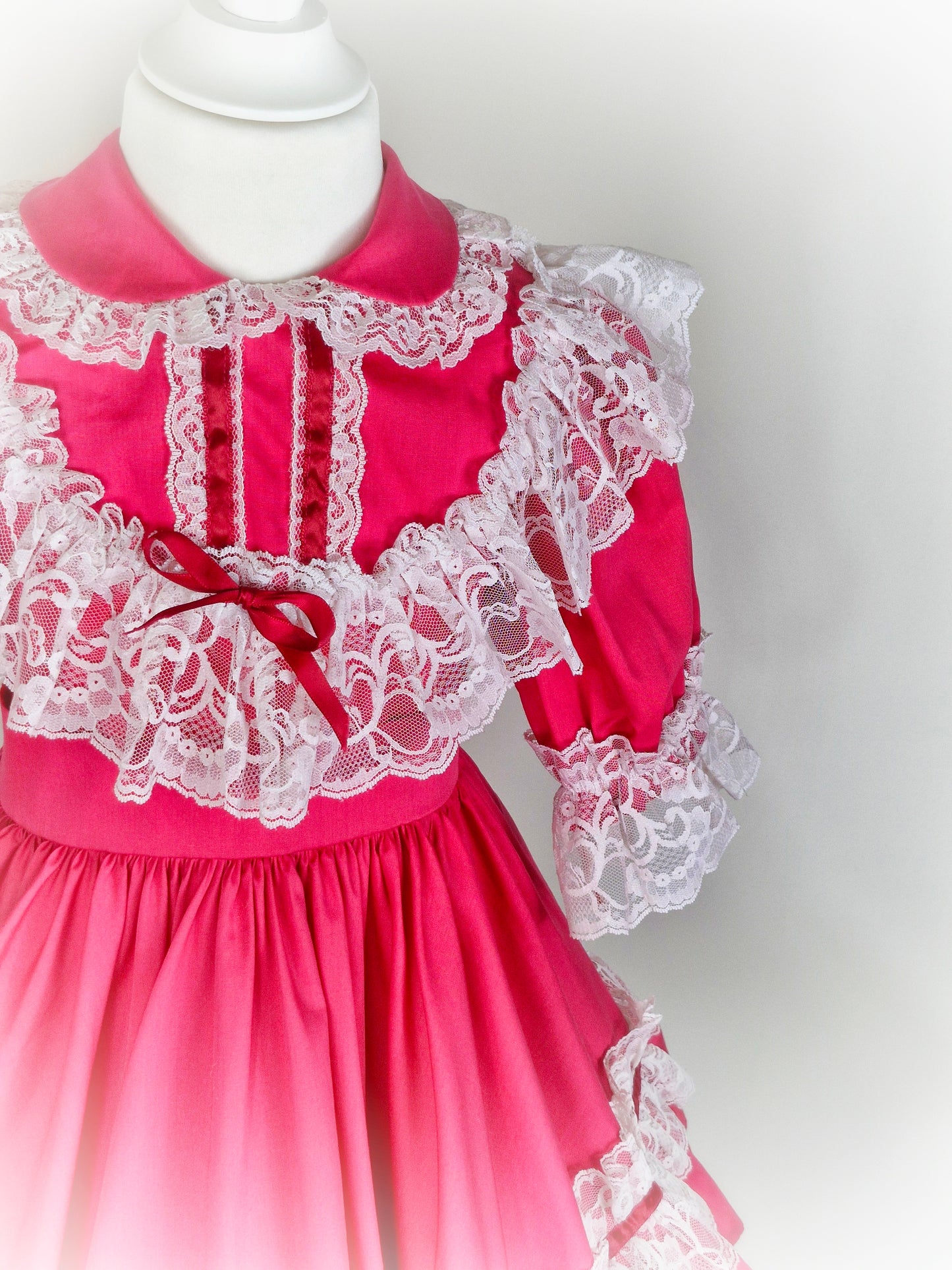 5 years. Hot pink Kotton Kandi vintage dress with Peter Pan collar and white lace details