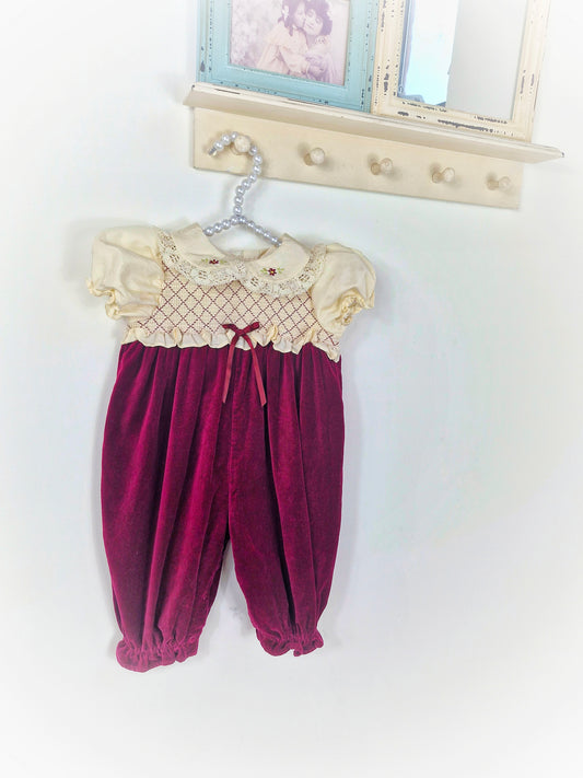 9-12 months. Burgundy velvet and cream smock romper with embroidered collar