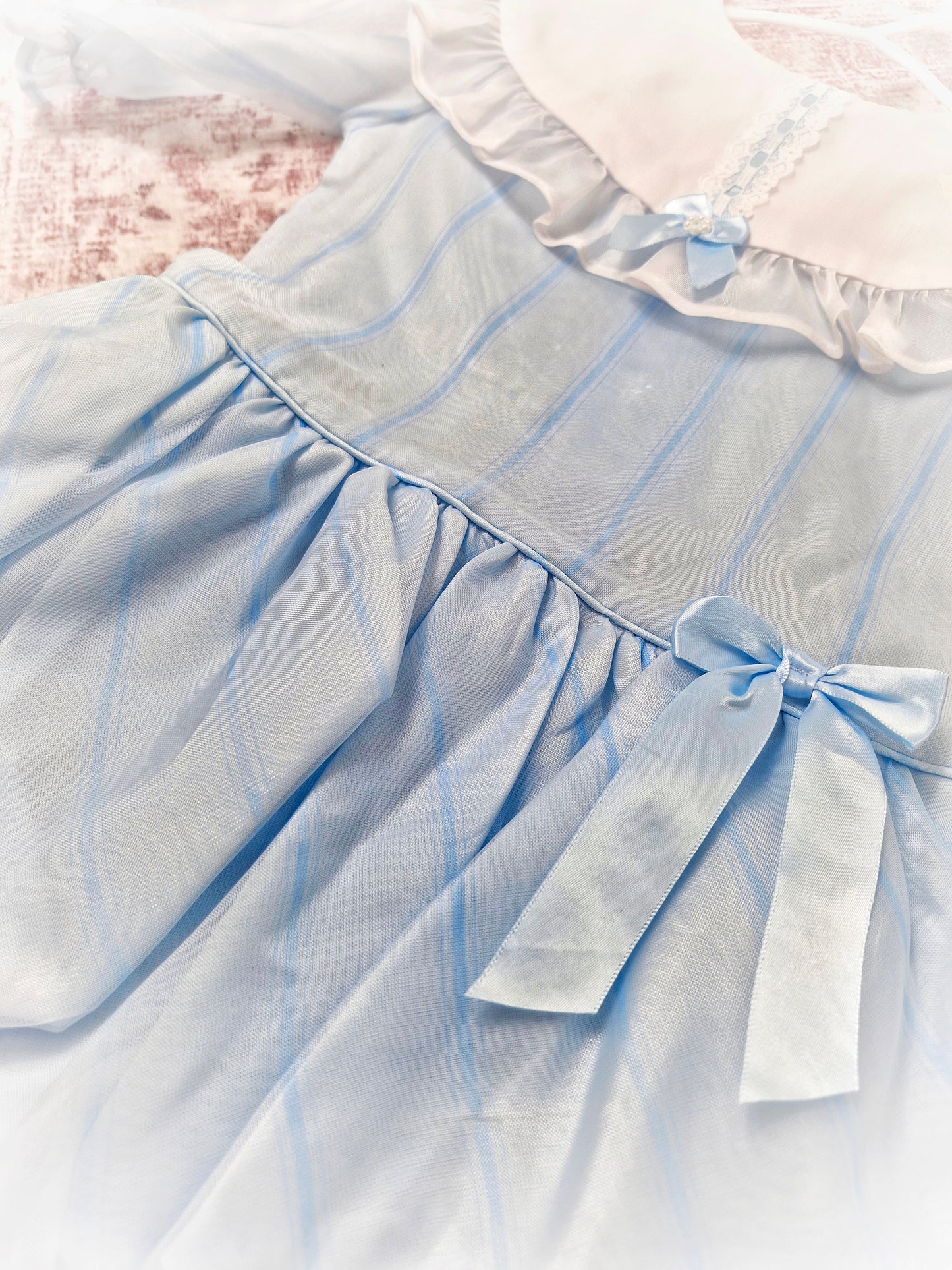 2-3 years. Pale blue striped vintage taffeta dress with white bib, blue ribbon and bubble hem