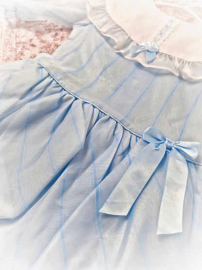 2-3 years. Pale blue striped vintage taffeta dress with white bib, blue ribbon and bubble hem