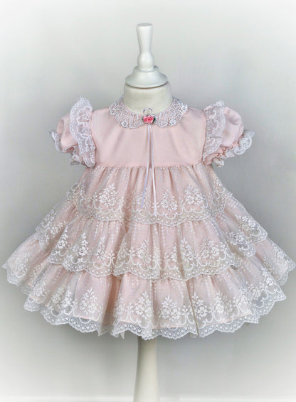18-24 months. Vintage Jolene, pale pink with white lace layers, flutter puff sleeves and lace collar