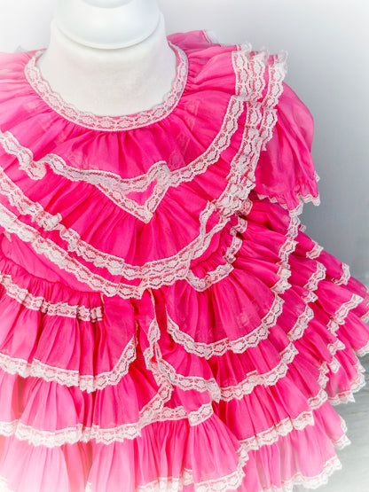2 years. Hot pink vintage ruffle dress with white lace trim