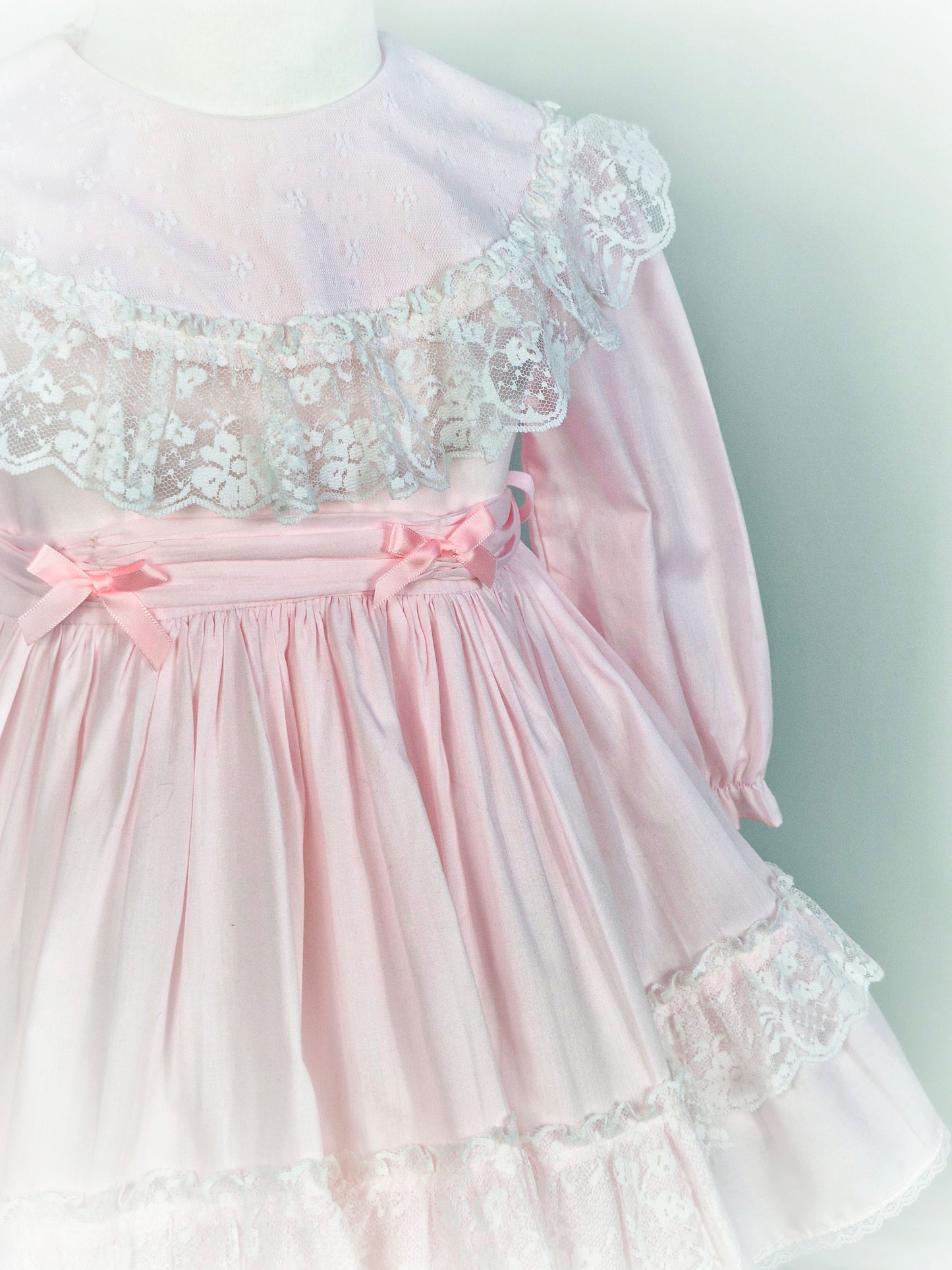 3 years. Long sleeve pink vintage dress by Sandys Girls, white lace details, pink tieback with ribbons