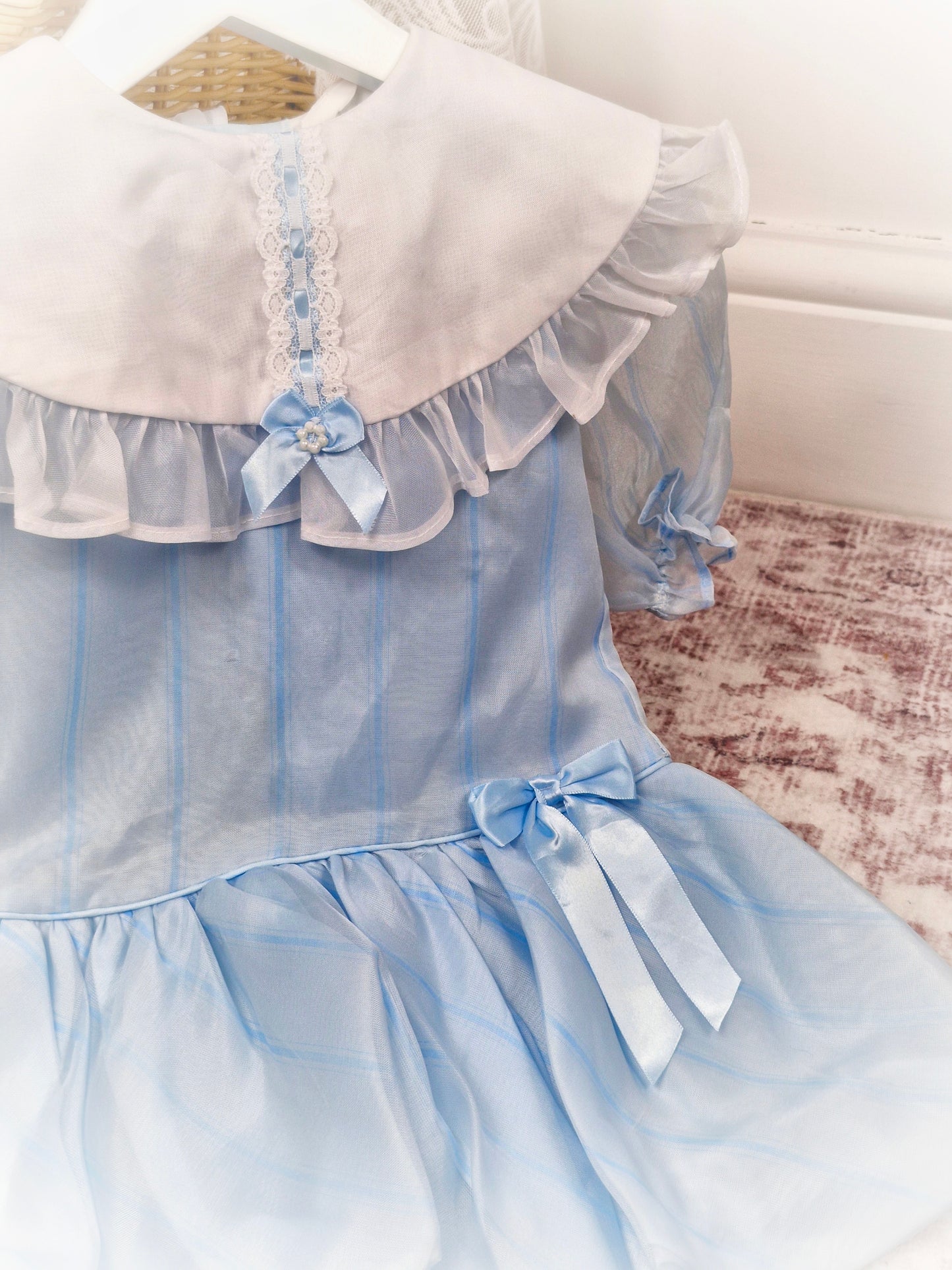 2-3 years. Pale blue striped vintage taffeta dress with white bib, blue ribbon and bubble hem