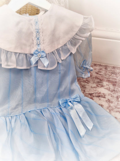 2-3 years. Pale blue striped vintage taffeta dress with white bib, blue ribbon and bubble hem