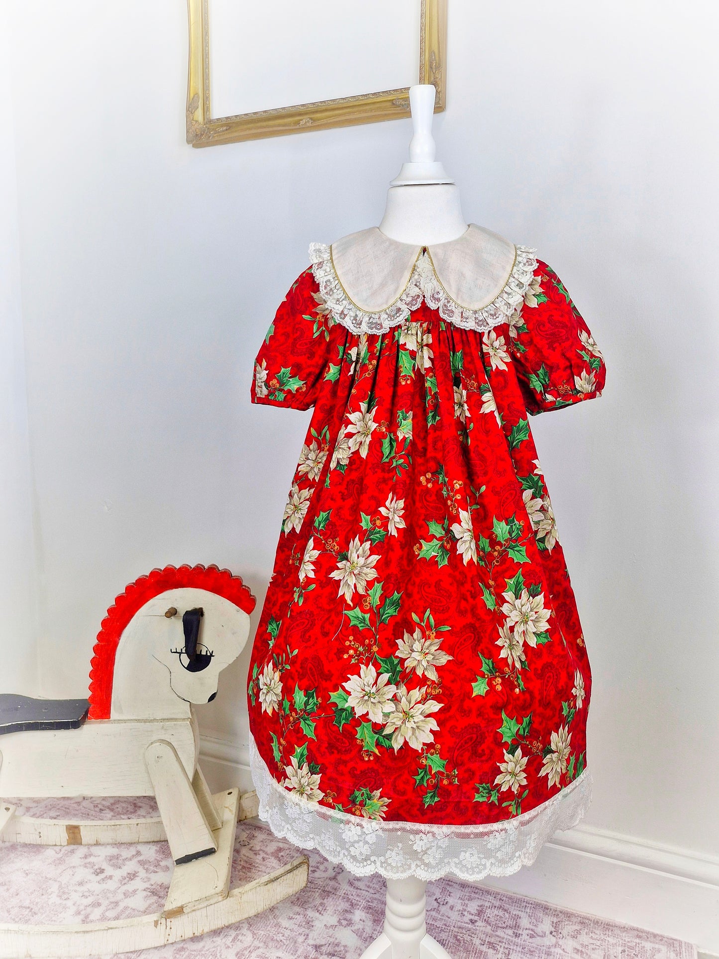 7 years. Red festive vintage dress by Rare Editions. Off white lace hem and bib