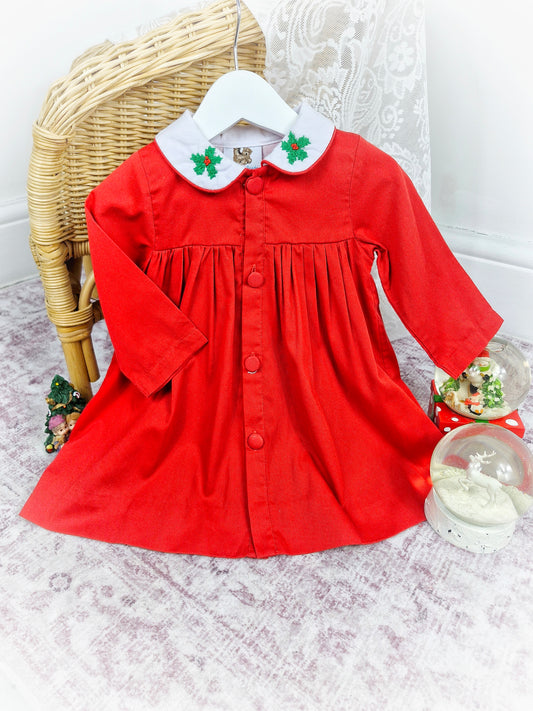 2 years. Red button down vintage inspired dress with long sleeves and white collar embroidered with holly leaves and berries