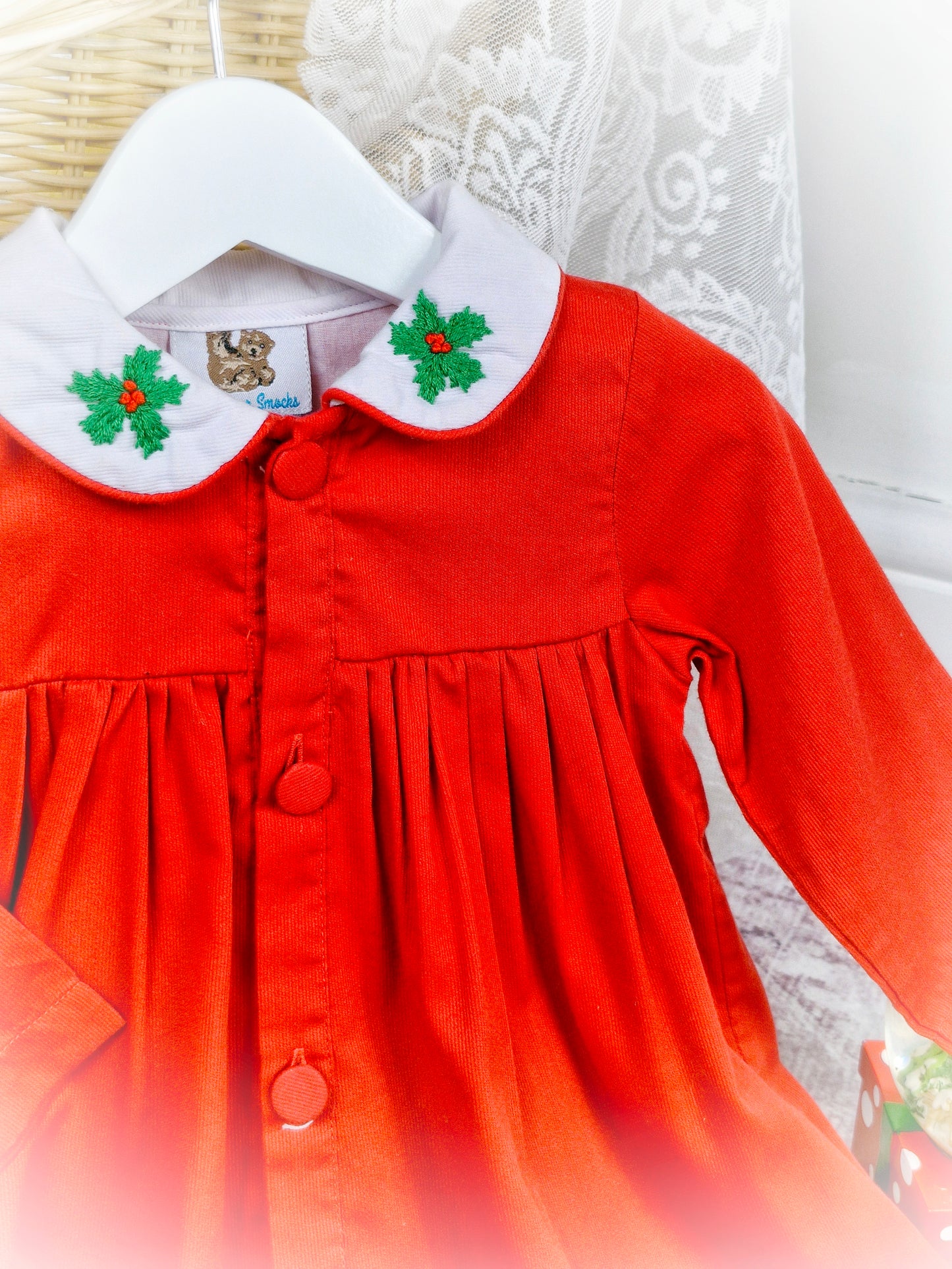 2 years. Red button down vintage inspired dress with long sleeves and white collar embroidered with holly leaves and berries